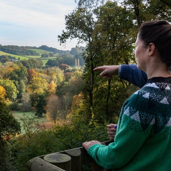 Visitors enjoying the view at Winkworth Arboretum, Surrey